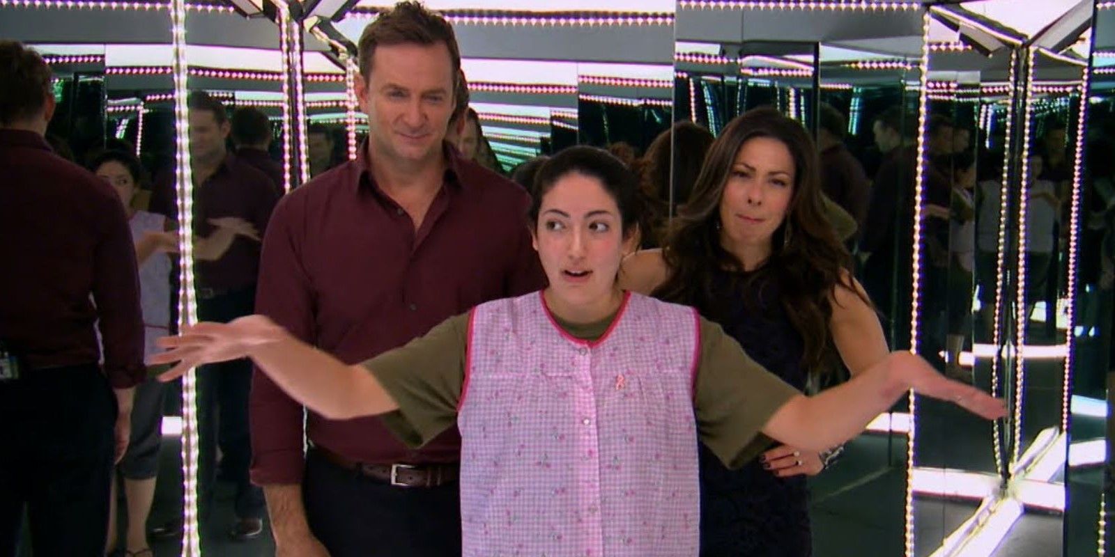 A scene from What Not to Wear featuring Stacy London and Clinton Kelly and a guest