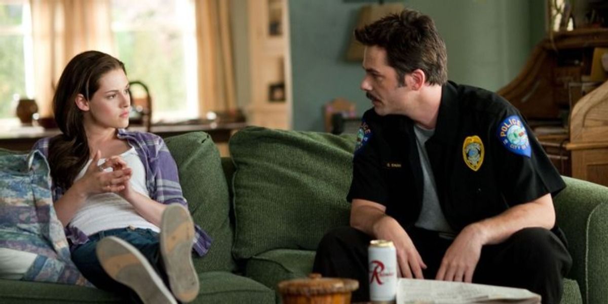 Bella Swan and Charlie Swan Sitting On The Couch in Twilight