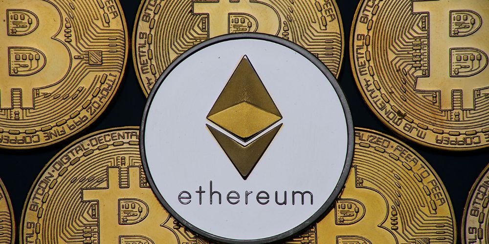 The Ethereum blockclain logo surrounded by Bitcoin