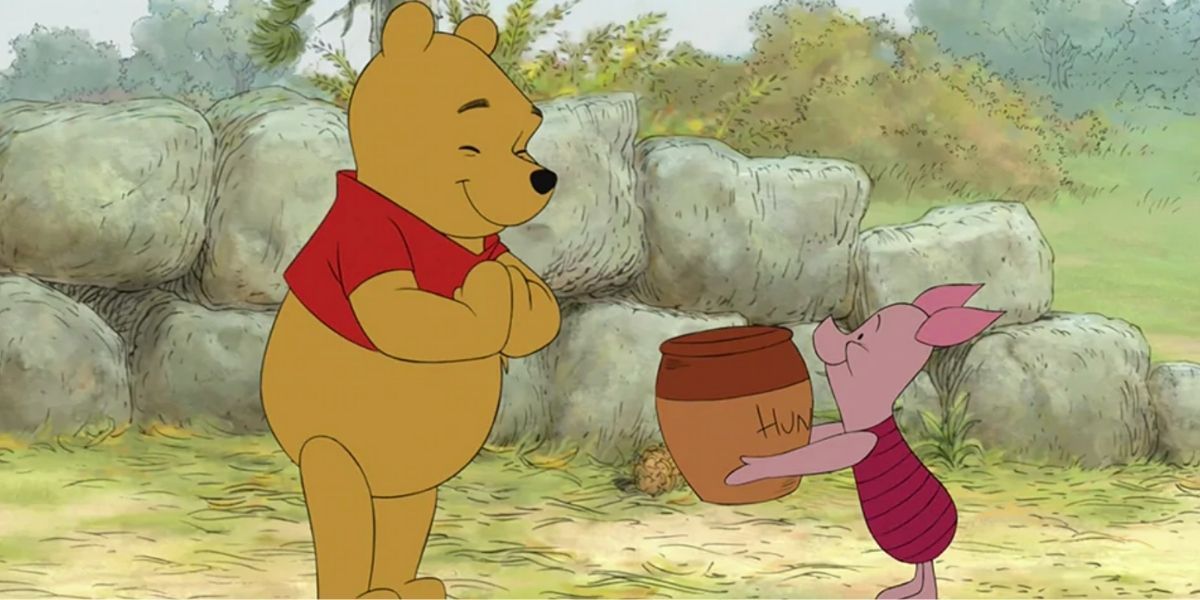 Piglet offering Winnie the Pooh a hunny pot