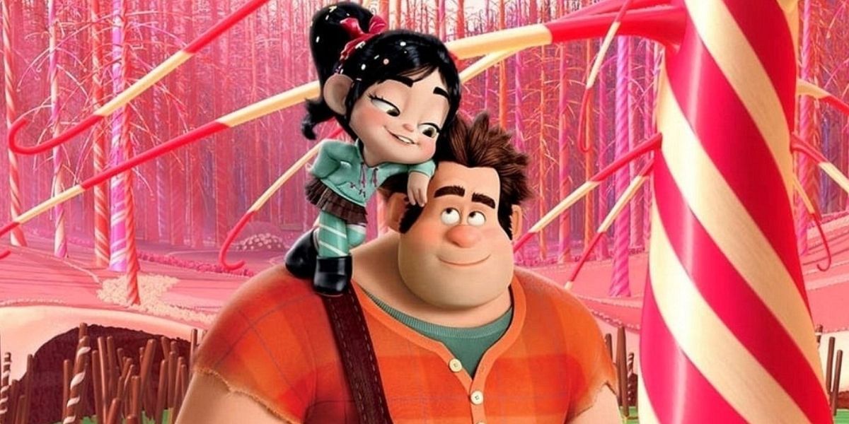 Vanellope standing on Ralph's shoulder in the candy cane forest in Wreck-it-Ralph.