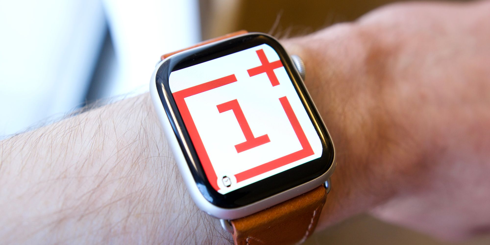 Apple Watch with OnePlus logo