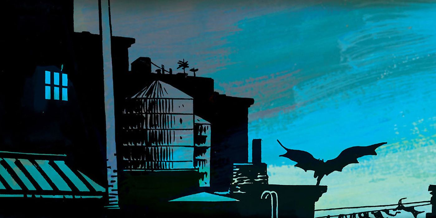 Batman runs on the rooftops in Gotham City in the Batman: Year One comic.