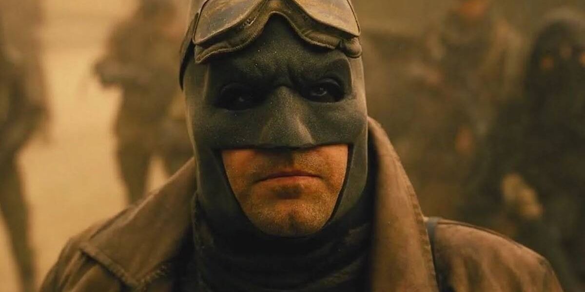 Batman surrounded by enemies in the Knightmare future
