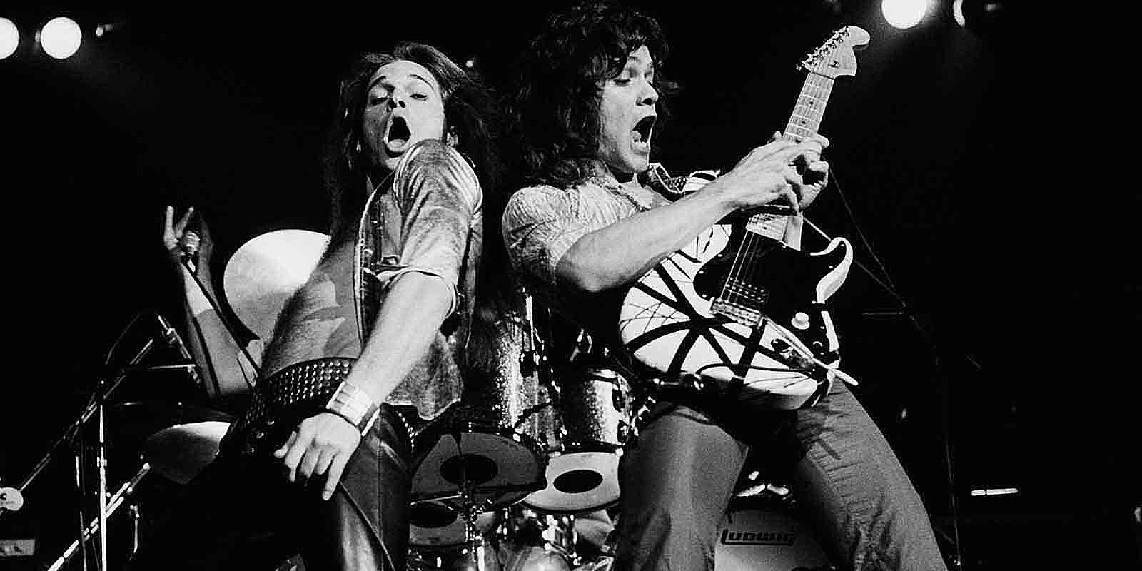 A black and white photo of David Lee Roth and Eddie Van Halen at a seventies concert