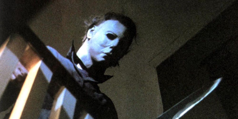 Michael with a butcher knife on the staircase in Halloween.