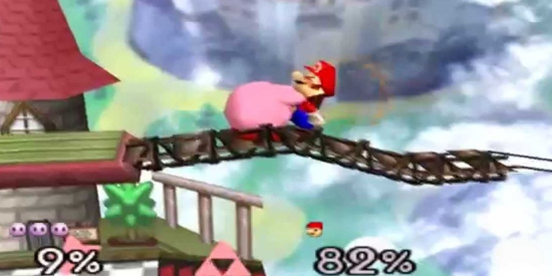 Kirby grabbing Mario in Super Smash Bros. 