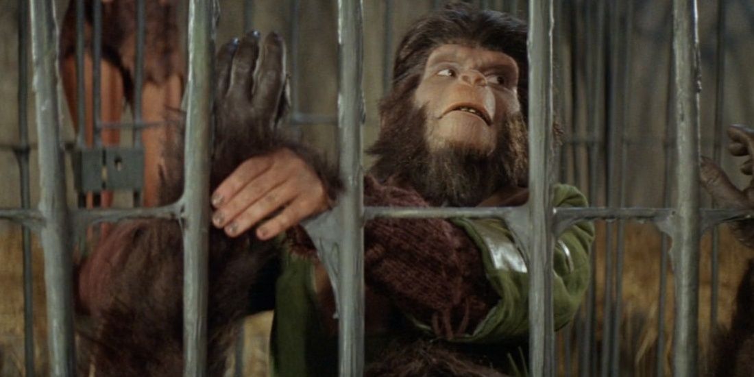 Lou Wagner as Lucis in Planet of the Apes, behind bars.