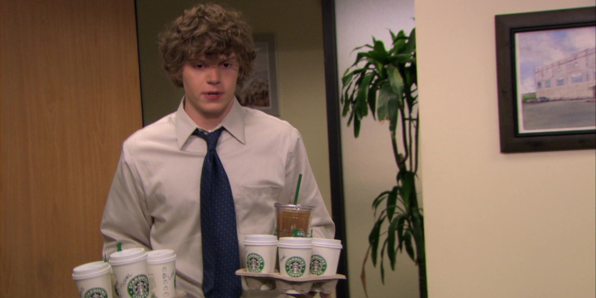 Luke bringing coffee to coworkers
