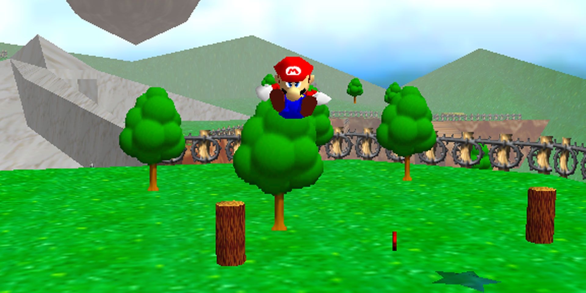 Mario jumping in Super Mario 64. There is also plenty of trees in the background