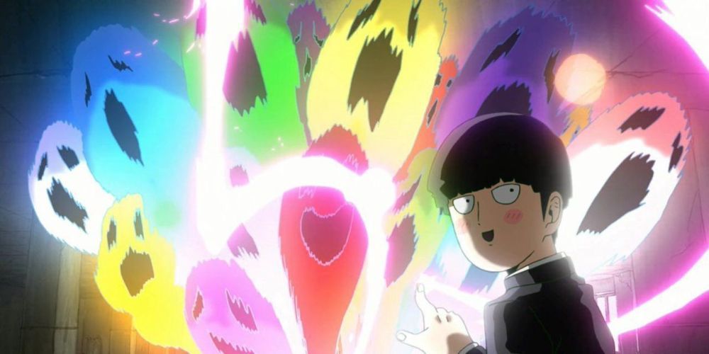 Mob with many colorful ghosts behind him in the Mob Psycho 100 anime.