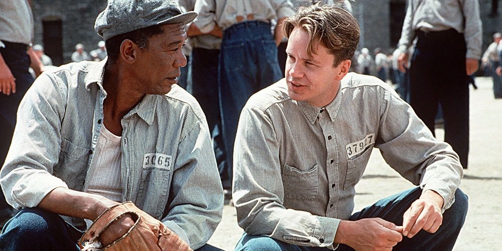 Andy and Red crouch to talk in The Shawshank Redemption