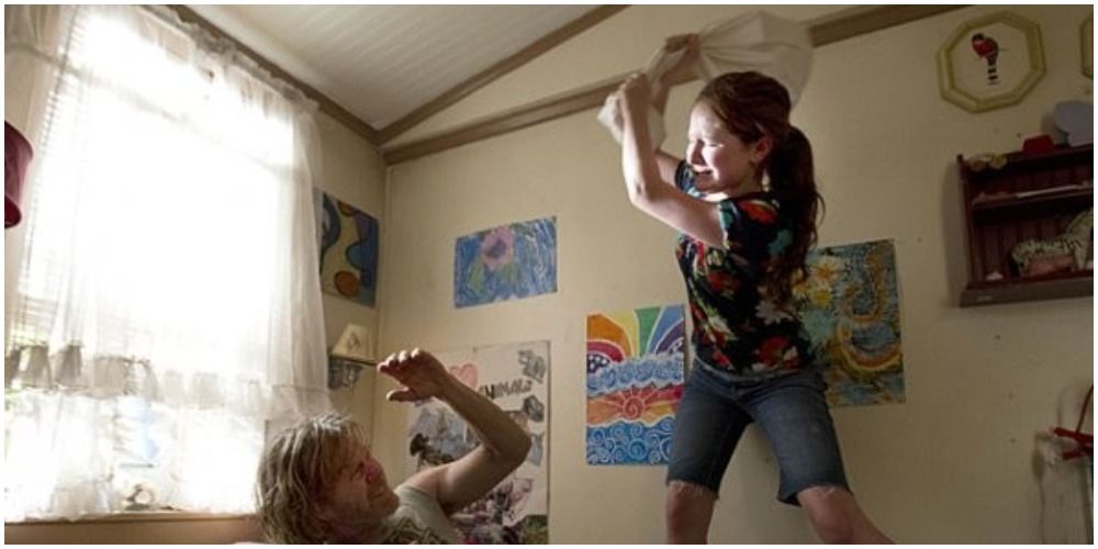 Debbie attacking Frank after he breaks her dollhouse .