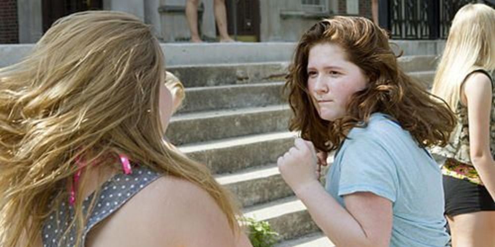 Debbie fighting her bully at the pool.