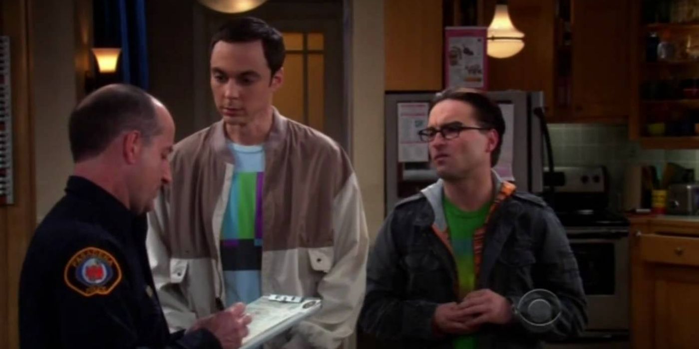 sheldon and leonard talk to a cop after being robbed on the big bang theory