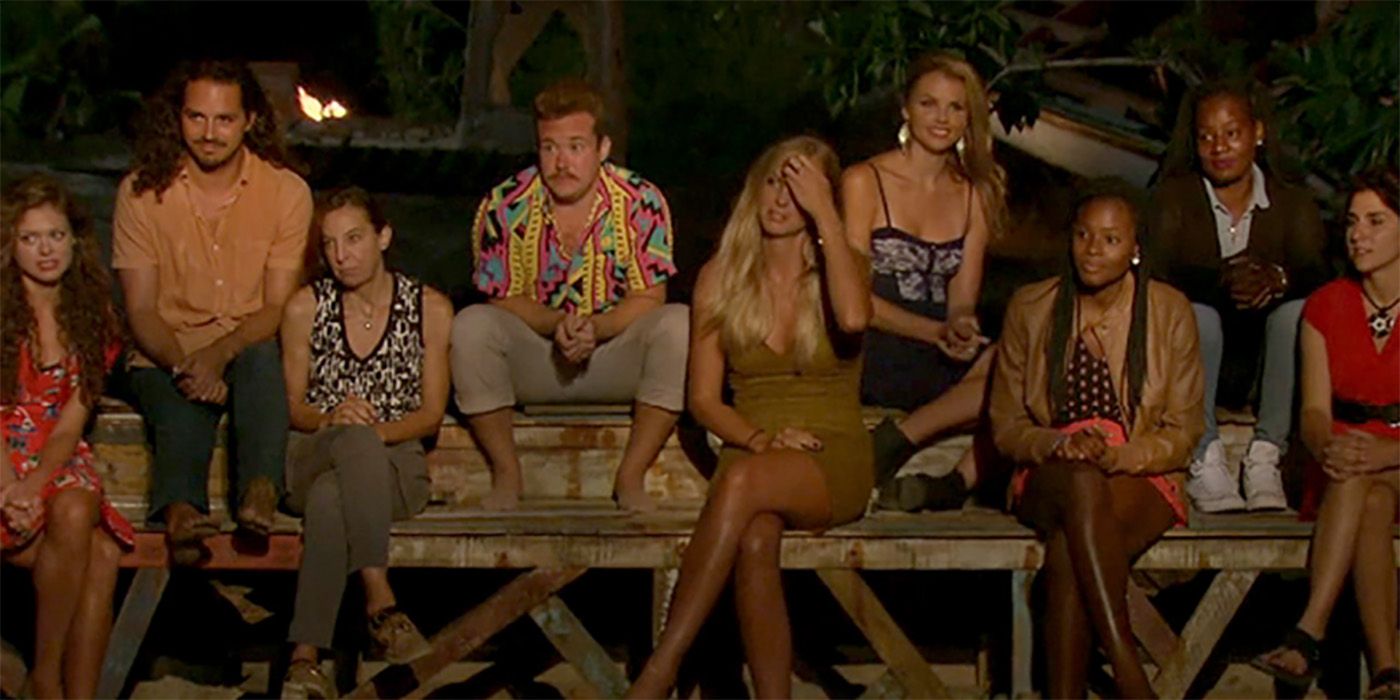 Survivor Jury listening to a Tribal Council going on