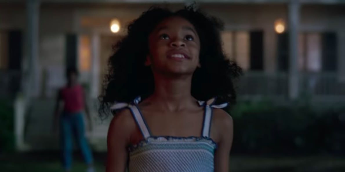 Monica Rambeau looking up in the sky in Captain Marvel