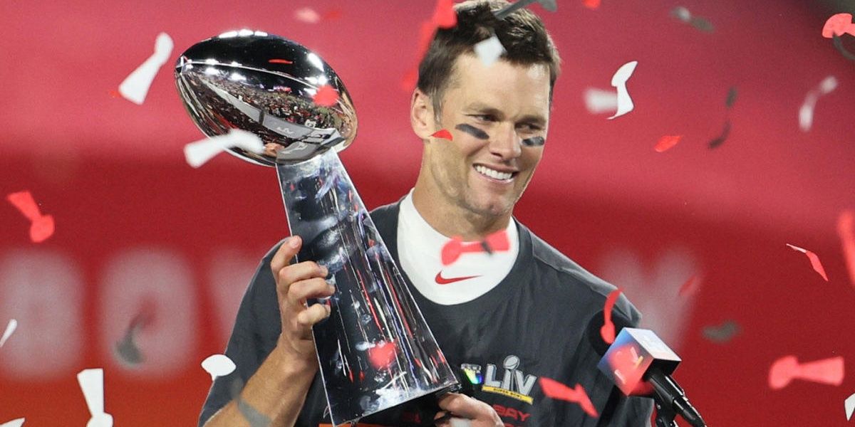 Tom Brady holds the Lombardi Trophy after winning the Super Bowl 