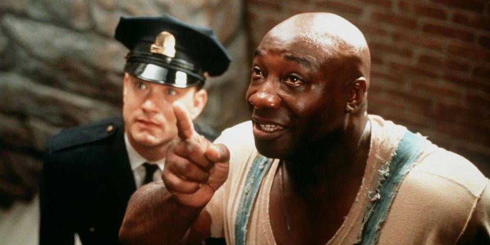 Paul and John look upward in The Green Mile