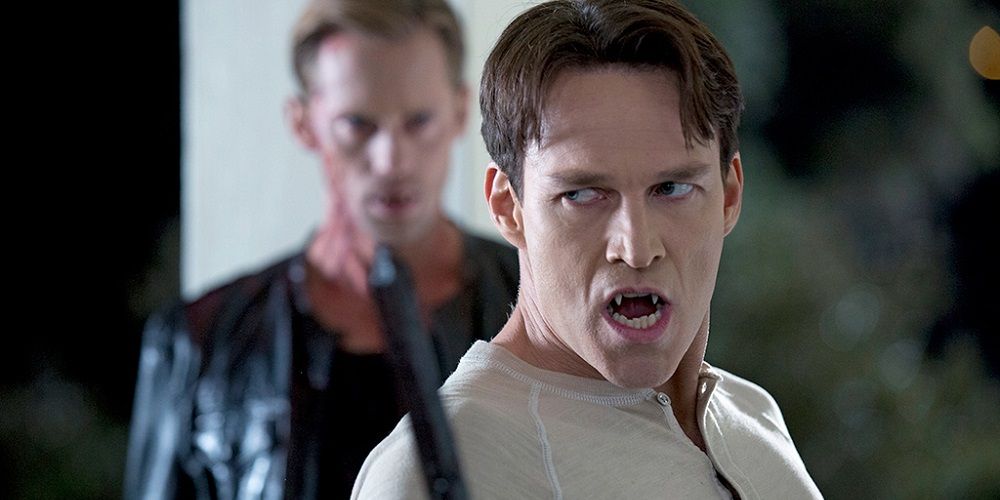 Bill flashes fangs and holds stake in True Blood