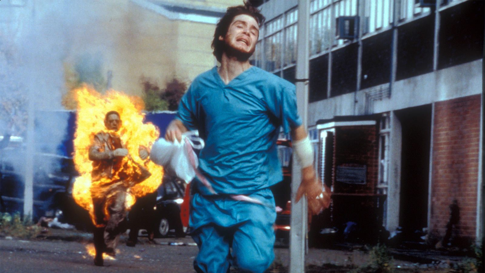 A survivor in 28 days later running from a zombie.