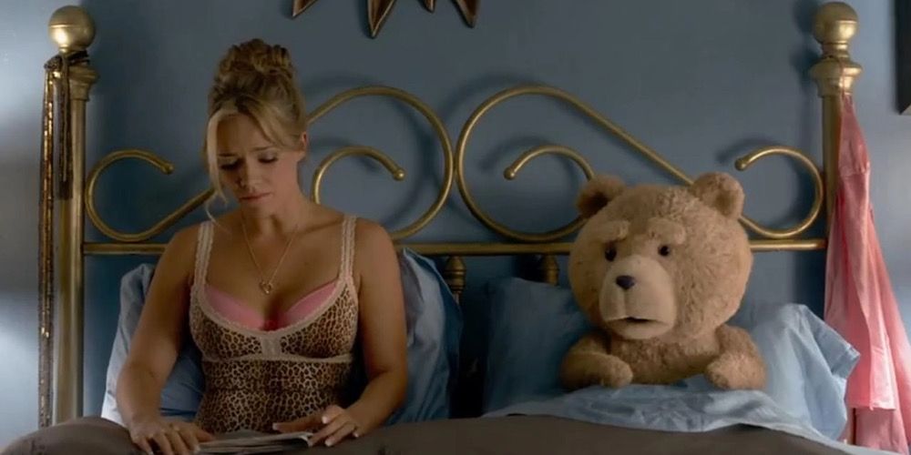 Tami-Lynn and Ted lay in bed together