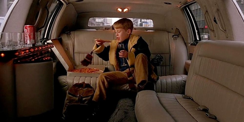 Kevin eats pizza in a limo in Home Alone 2