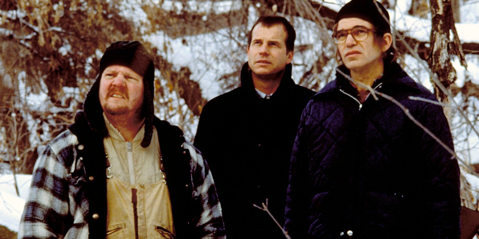 Hank, Mitchell and Lou in snowy woods in A Simple Plan