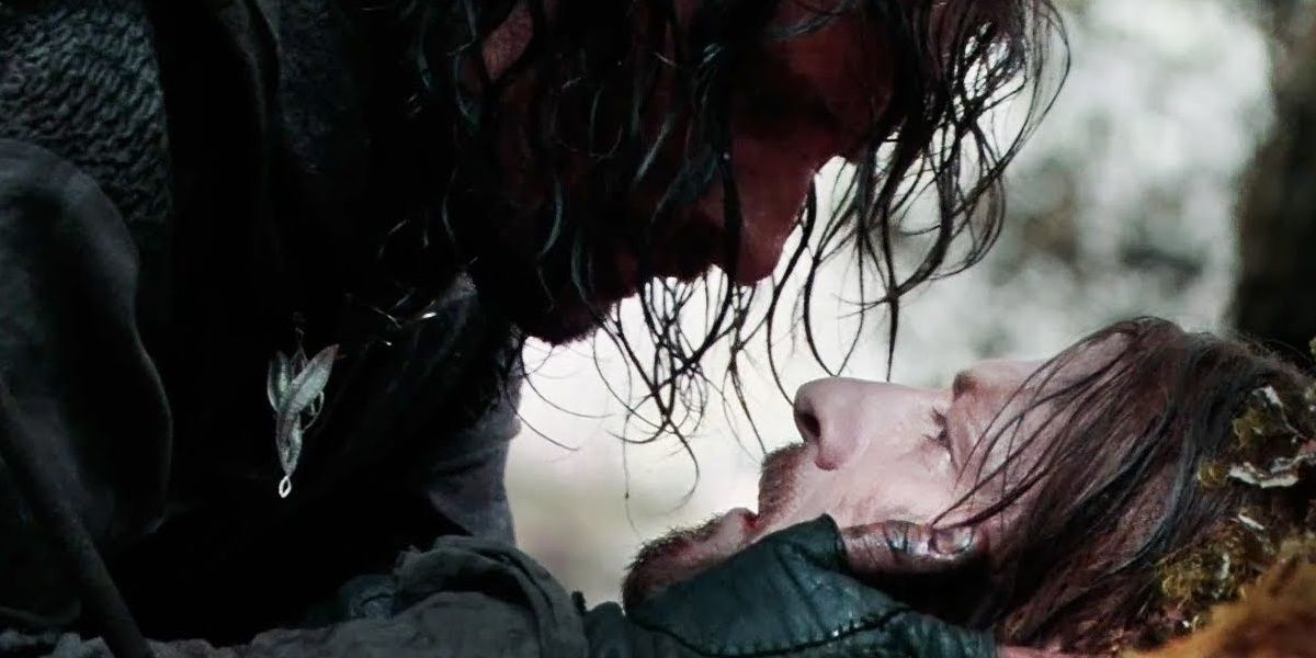 Aragorn with Boromir as he dies
