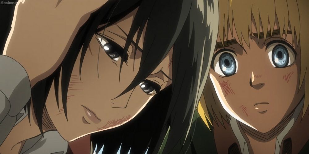 Armin and Mikasa in the Attack on Titan anime.