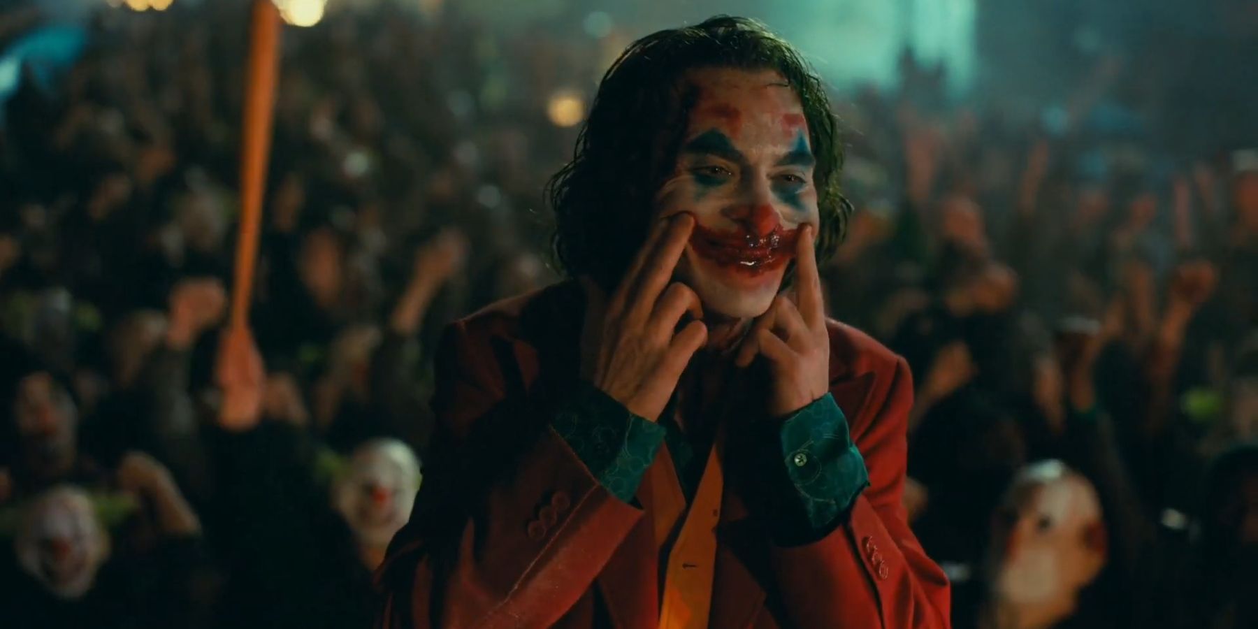 Arthur creating the blood smile in 2019's Joker