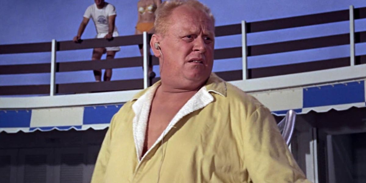Goldfinger in leisure attire at the beach in Goldfinger