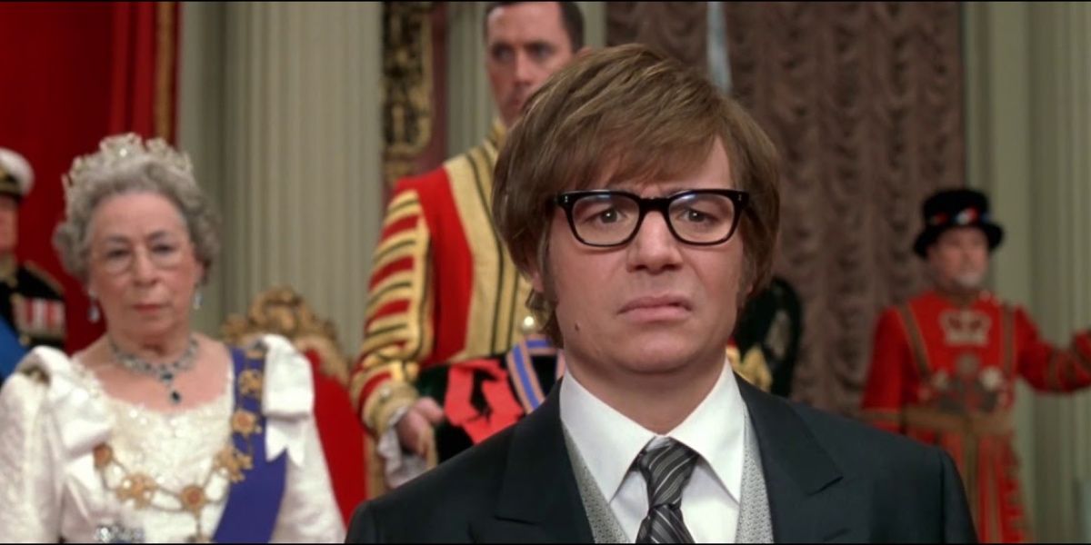 Austin Powers being knighted by the Queen