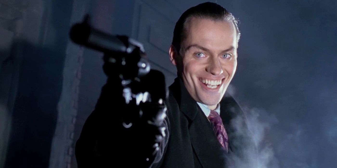 Young Jack Napier smiling cruelly after he kills the Waynes in Batman