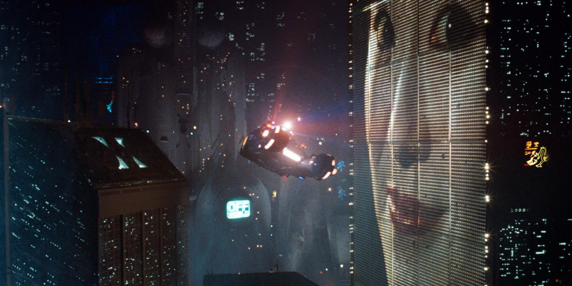 Flying car and digital billboard in Blade Runner