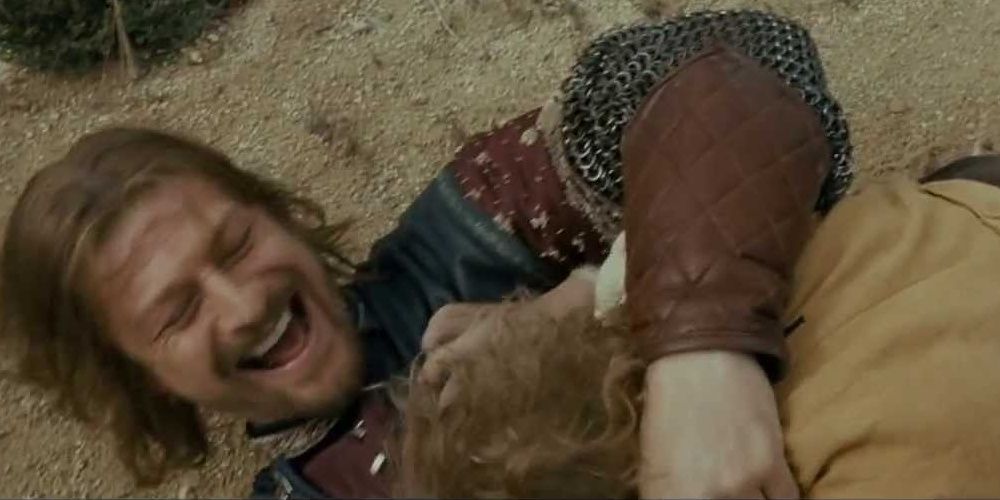 Boromir and Merry play fighting