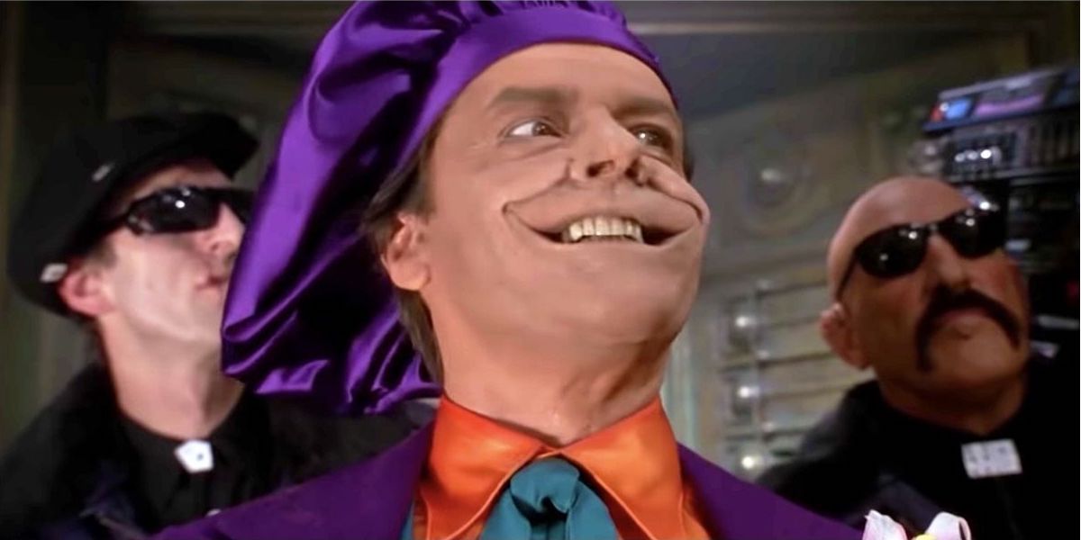 The Joker enters the museum of art to find Vicki Vale