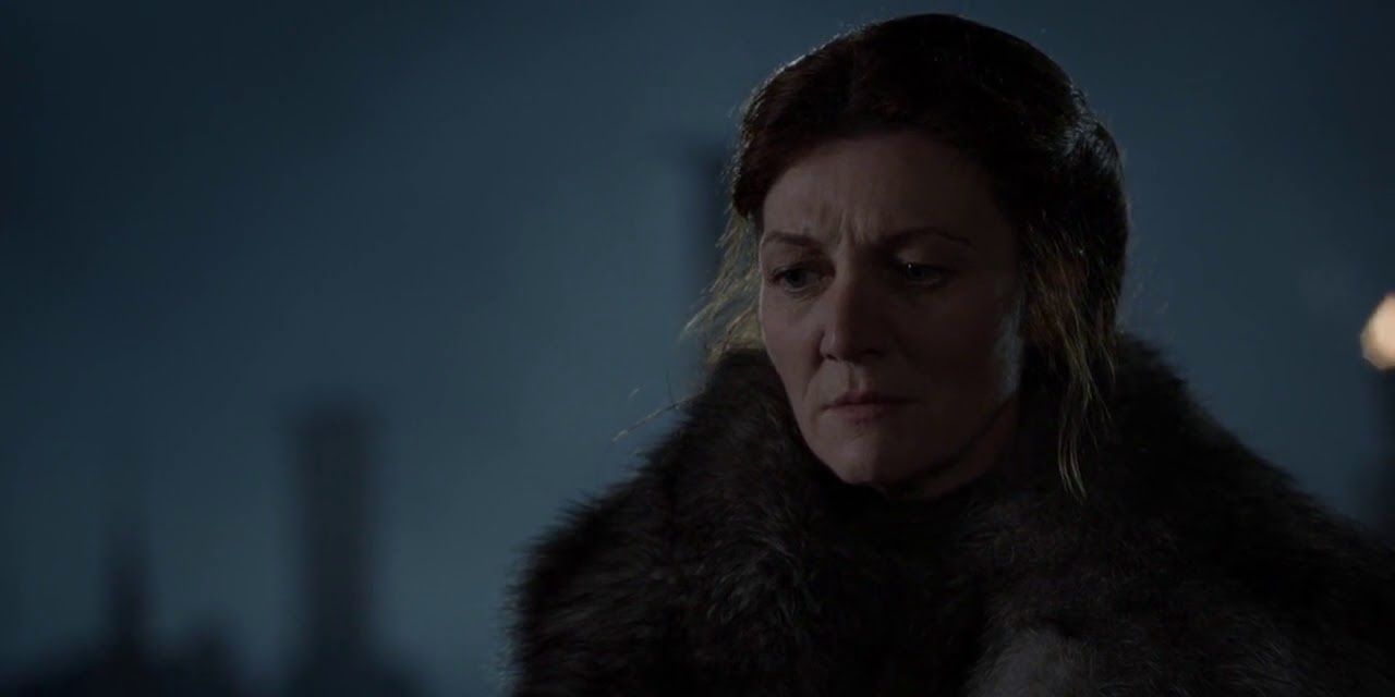 Catelyn Stark looks down at Jaime Lannister in Game of Thrones