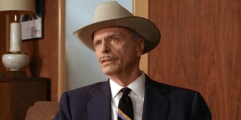 Conrad Hilton wearing a cowboy hat on Mad Men