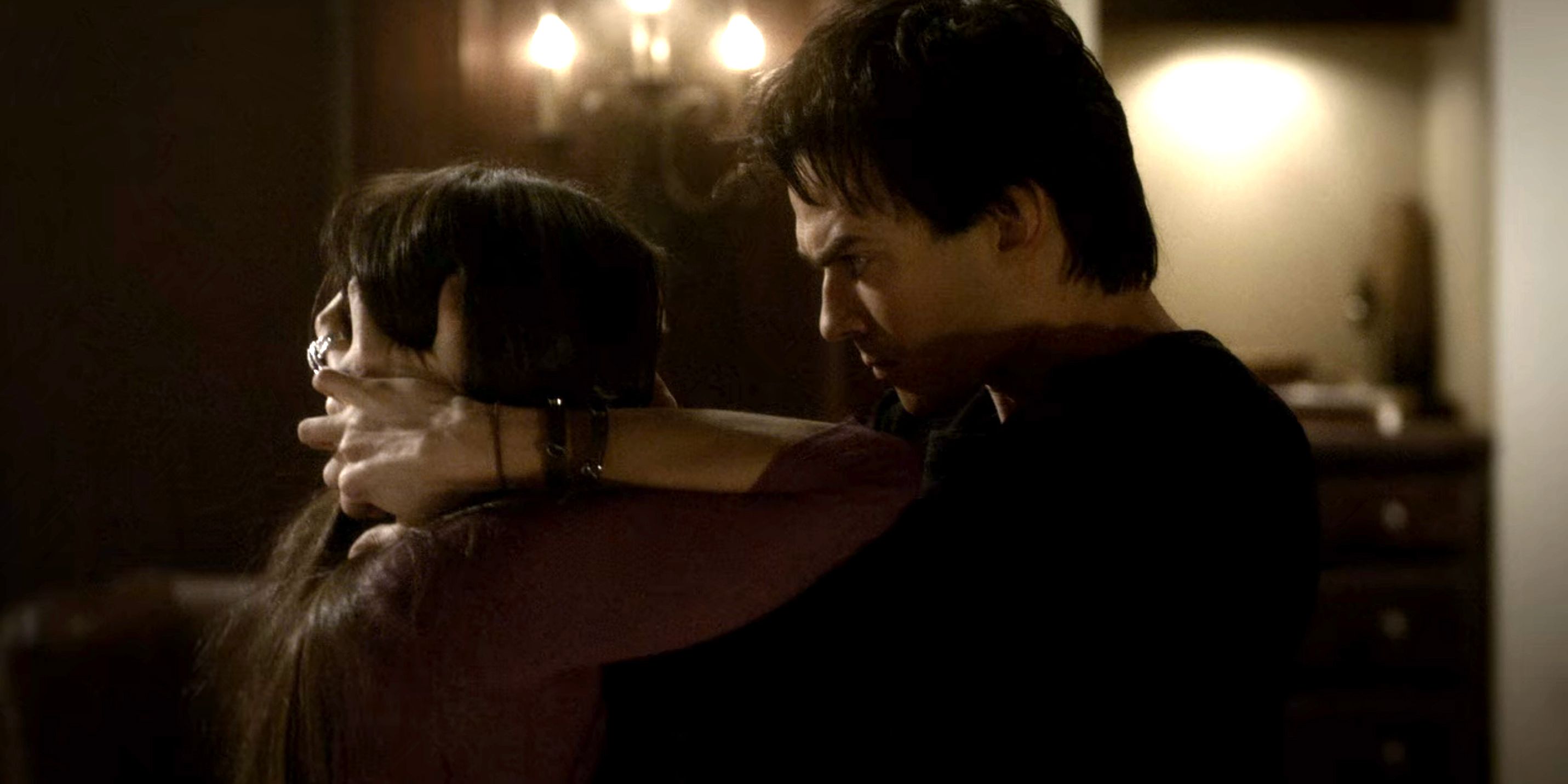 Damon feeds Elena his blood in The Vampire Diaries.