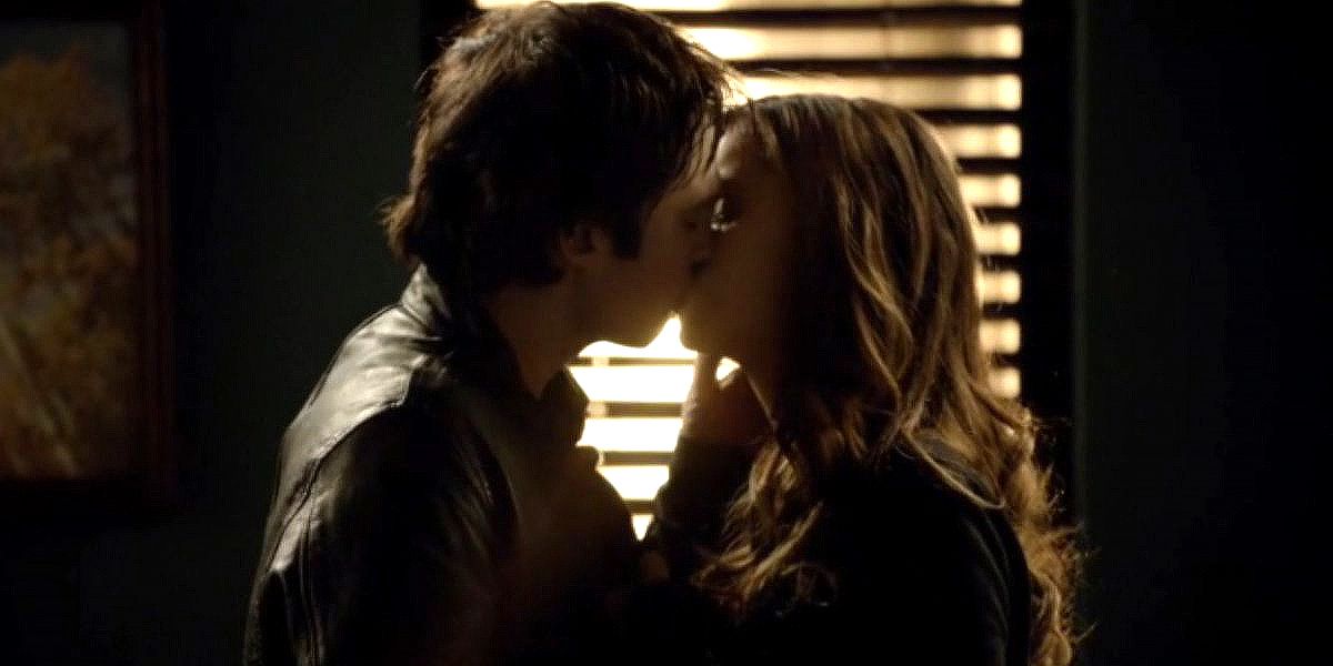 Elena kisses Damon in The Vampire Diaries.