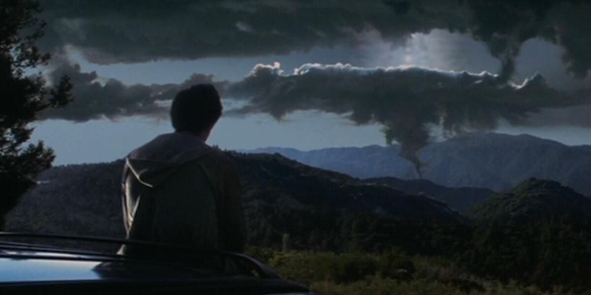 Donnie Darko looking out over storm cloud