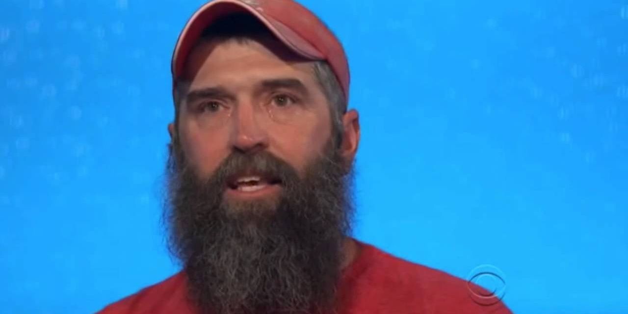 Donny Thompson appears in front of a solid blue background in Big Brother