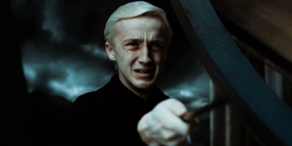 Draco Malfoy crying while attempting to kill Dumbledore