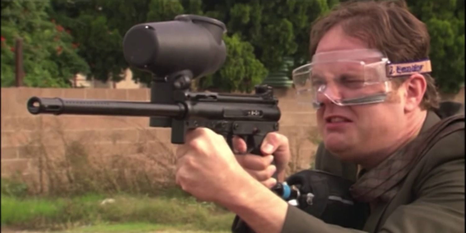 Dwight shoots a paint ball gun in The Office