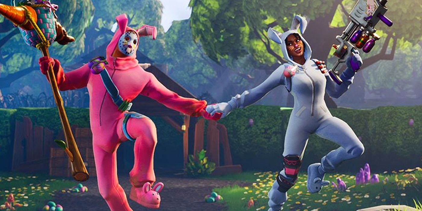 Two Fortnite players in bunny suits hold hands and dance
