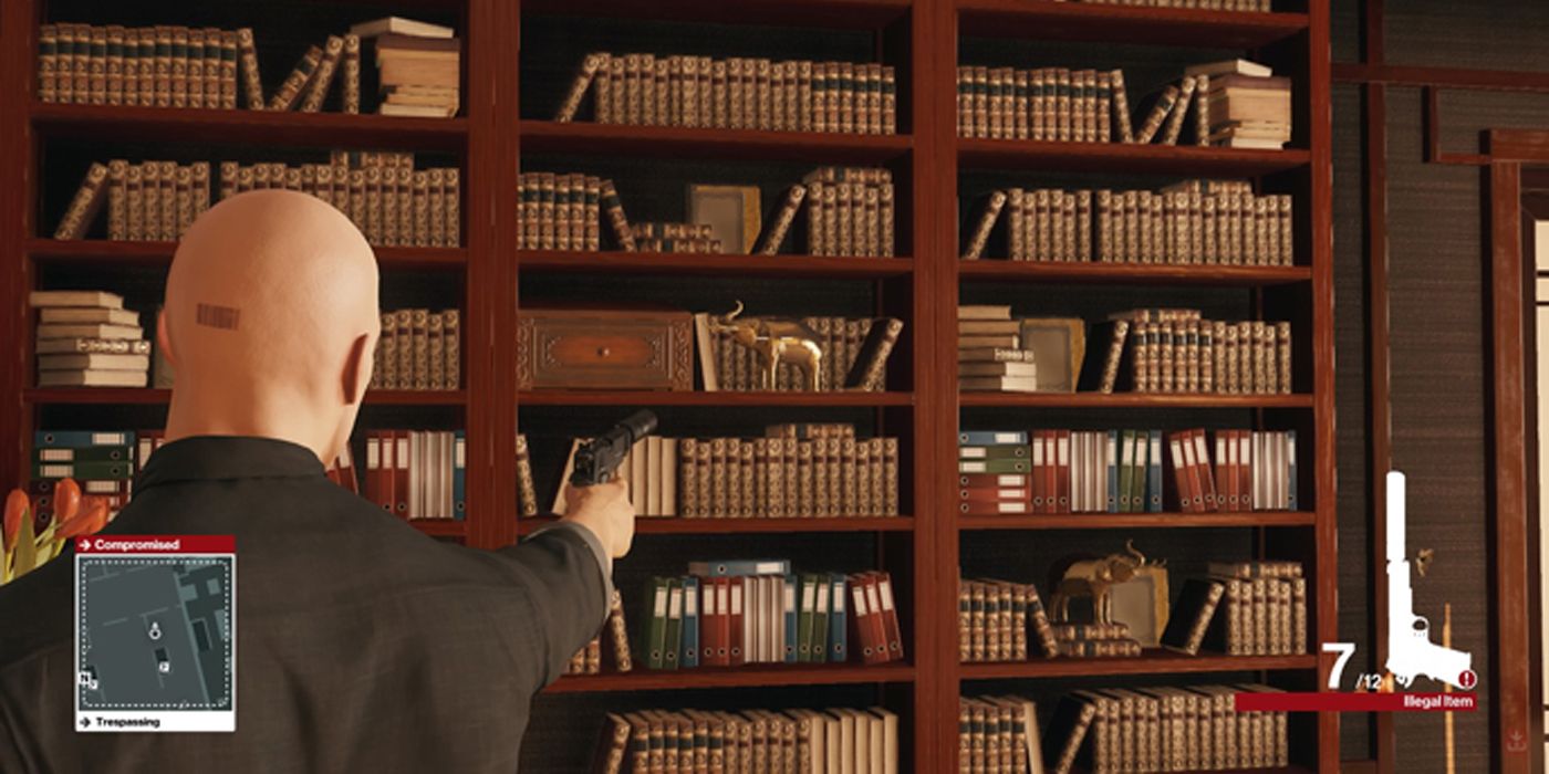 Agent 47 takes aim at a library in Hitman