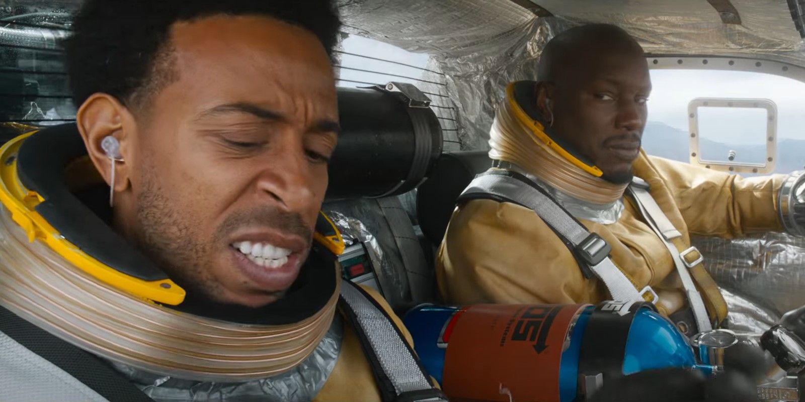 Tej (Ludacris) and Roman (Tyrese Gibson) in space car in Fast and Furious 9