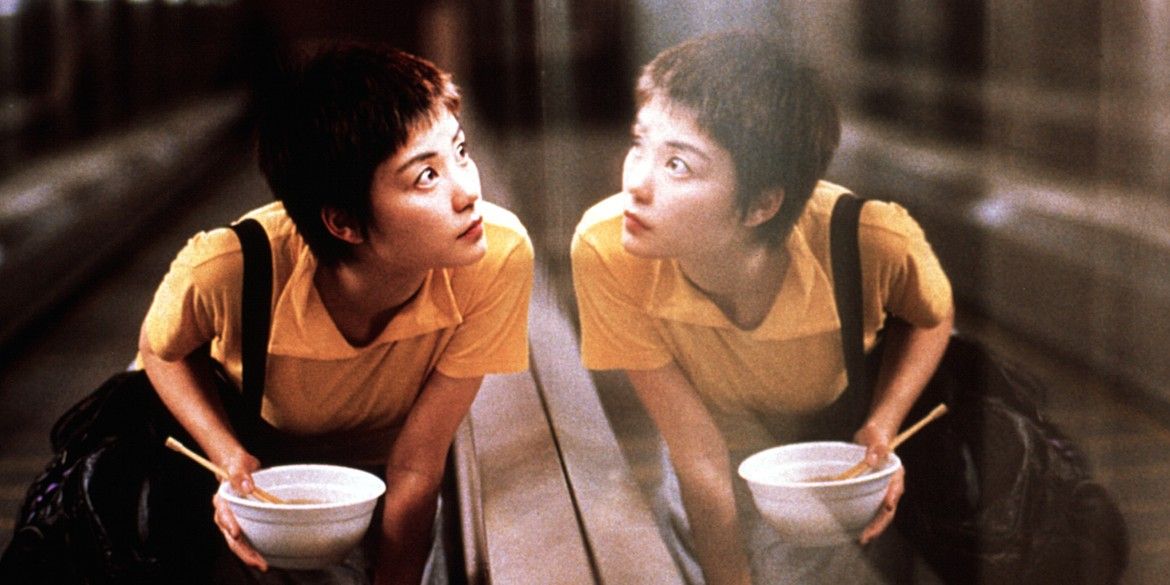 Faye Wong looking at her reflection in Chungking Express