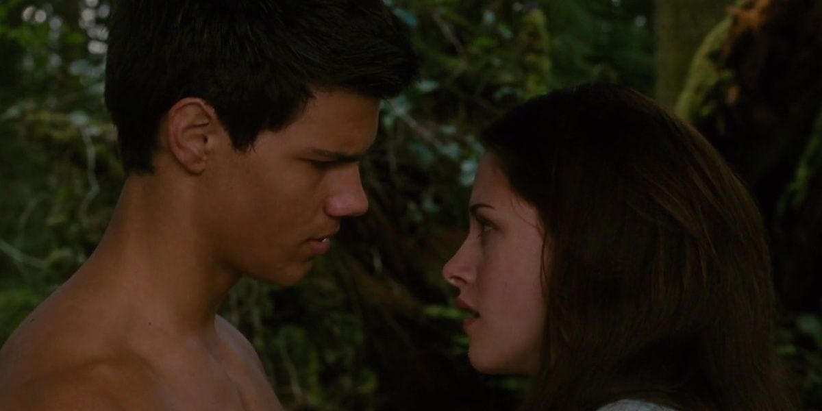 Jacob and Bella talking in the woods